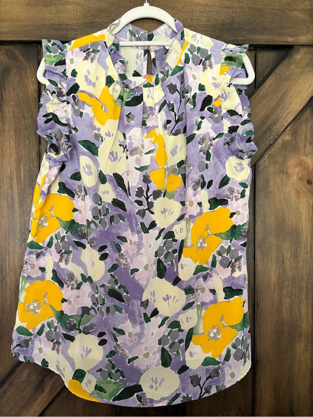 Sleeveless Floral Ruffle Neck Blouse